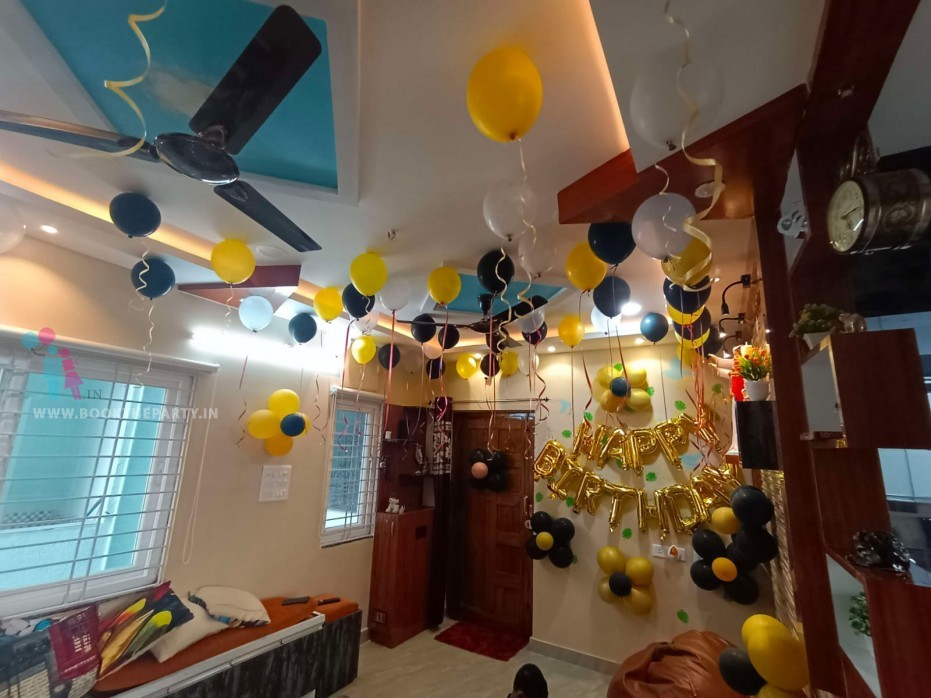 Yellow and black balloons decor