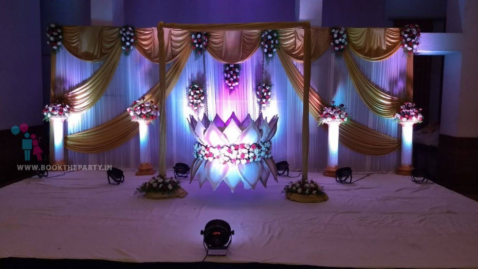 Lotus Cradle With White and Gold drapes Theme