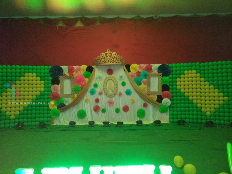 Crown Theme with Balloon Wall and Paper Fans