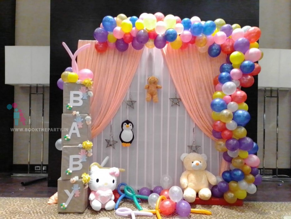 White and Peach Drapes with Balloon Decor 