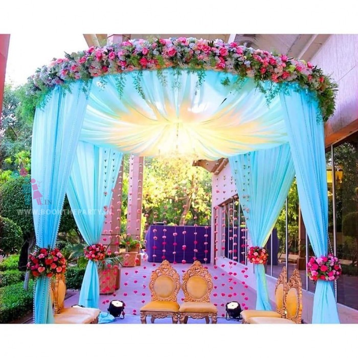 Mandapam with Blue Drapes and Artificial Flowers 