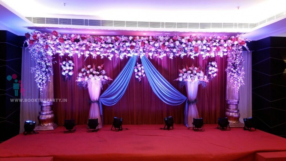 Flower Border With Blue Drapes 