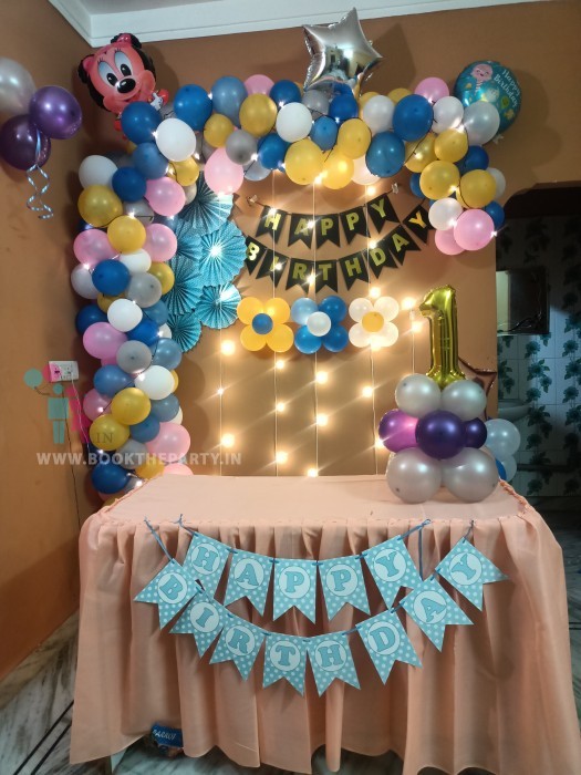 Multi colour balloons decor with fairy lights