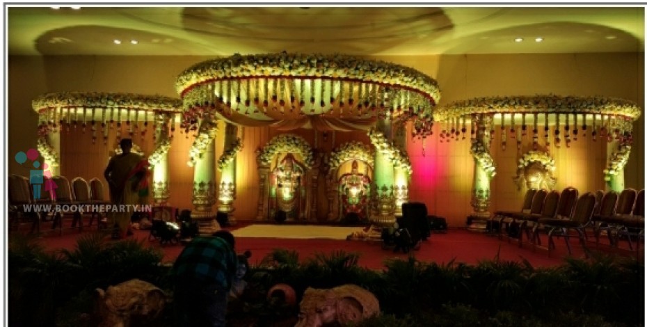Round Mandapam with Drapes and Garlands Hanging 