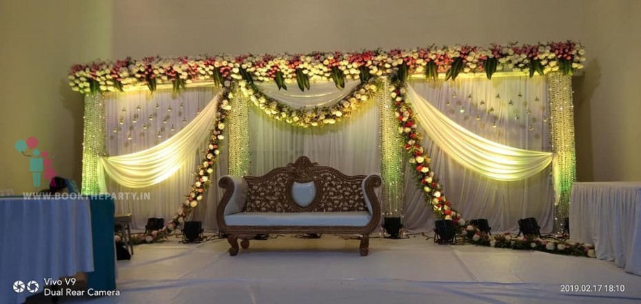 White Drapes With Mirror Hanging Pillars Theme