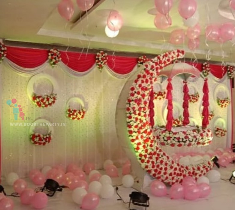 White & Red Drapes With Moon Cradle Theme 