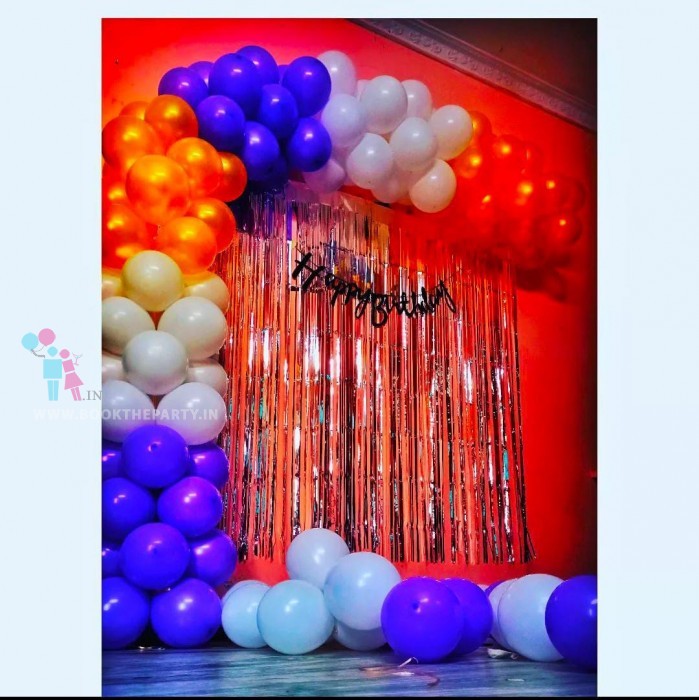 Blue,white and red balloons decor with streamers