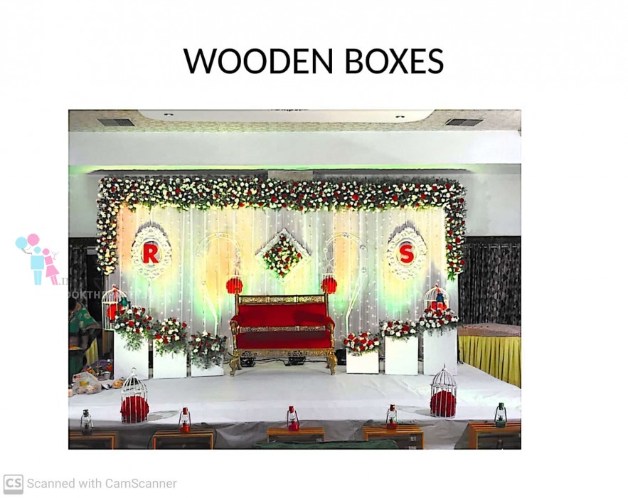 Stage with Wooden Boxes and Floral Decor 