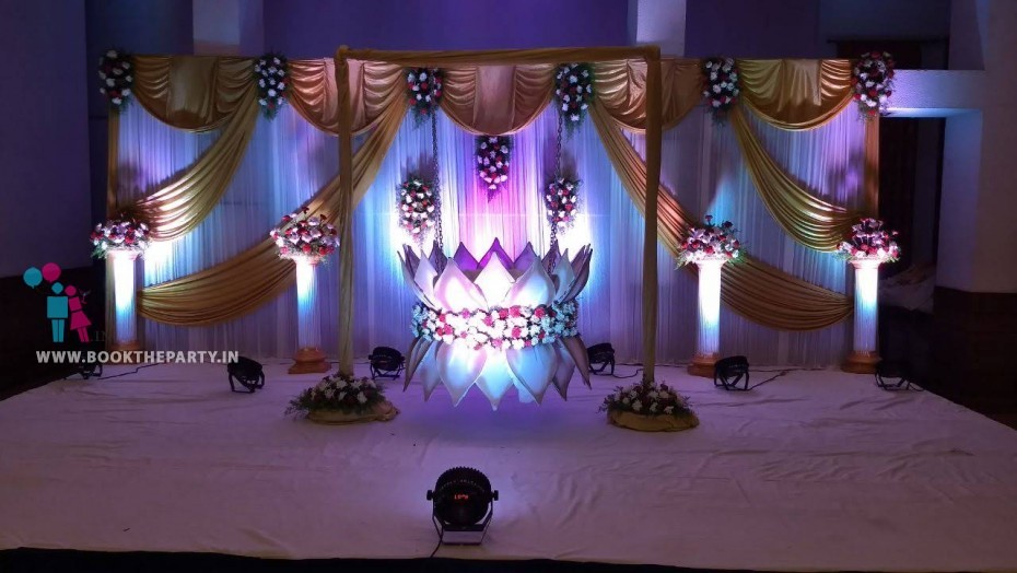 Lotus Cradle With White and Gold drapes Theme