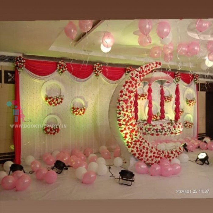 White & Red Drapes With Moon Cradle Theme 