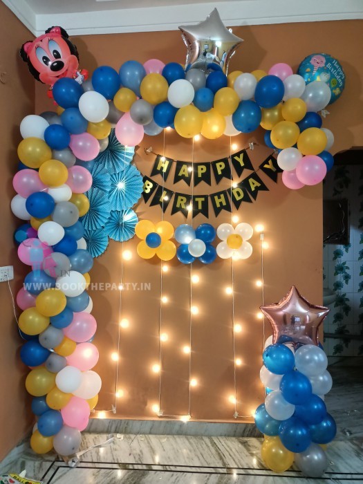 Multi colour balloons decor with fairy lights