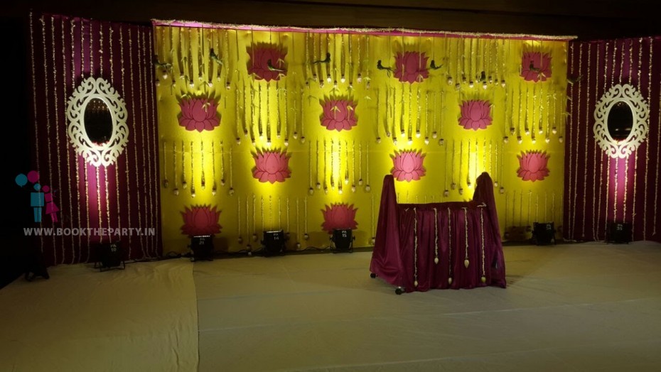 Lotus with Yellow and Maroon Drapes