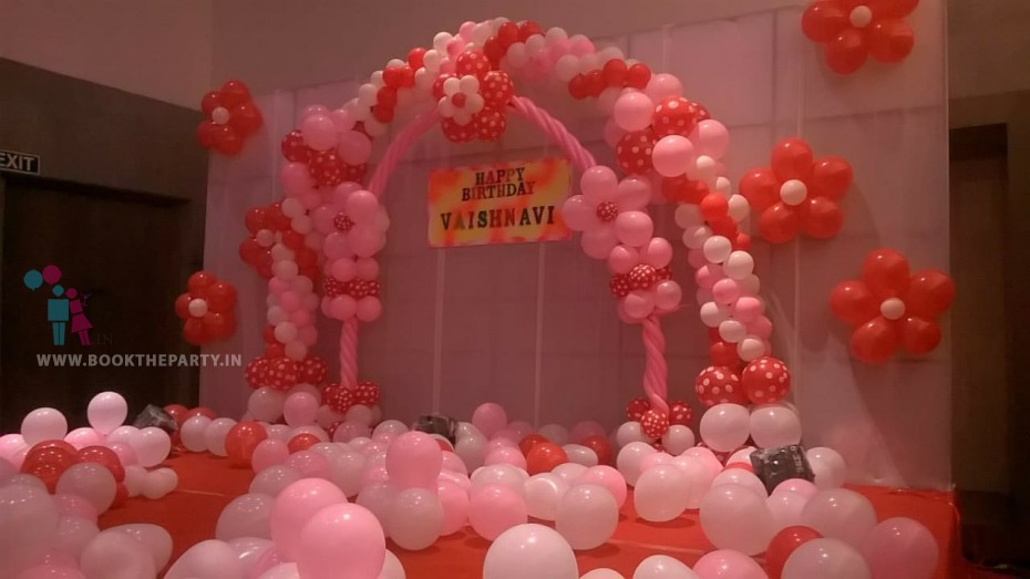 Dual Balloon Arch Theme with Flower Balloons 
