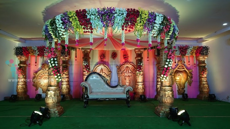 Round Mandapam with White and Pink Drapes Theme