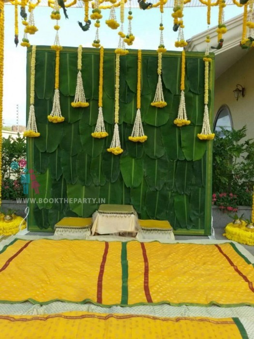 Banana Leaves Backdrop with Lily & Marigold Flowers 
