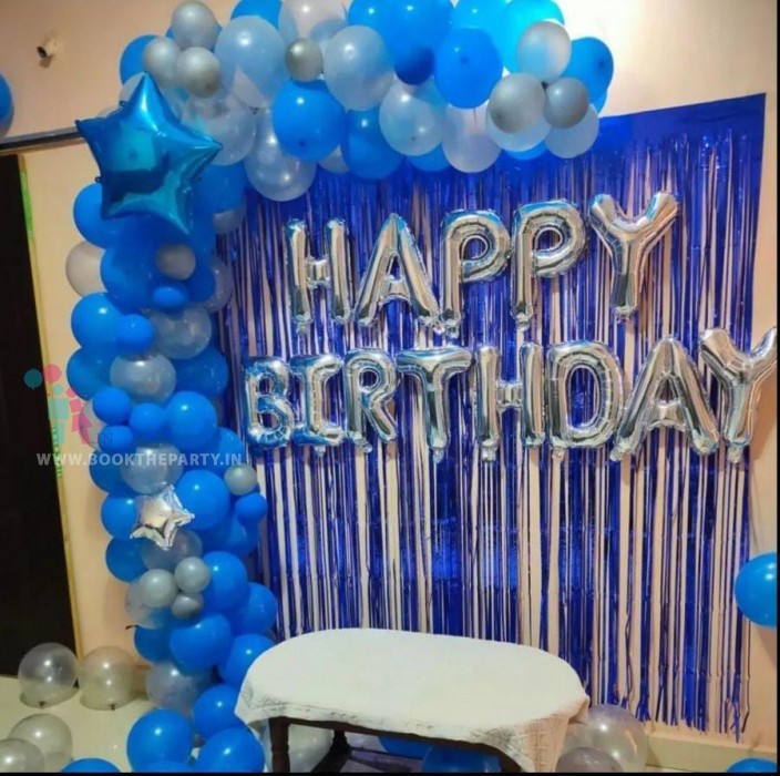 Blue and silver balloons decor with streamers 