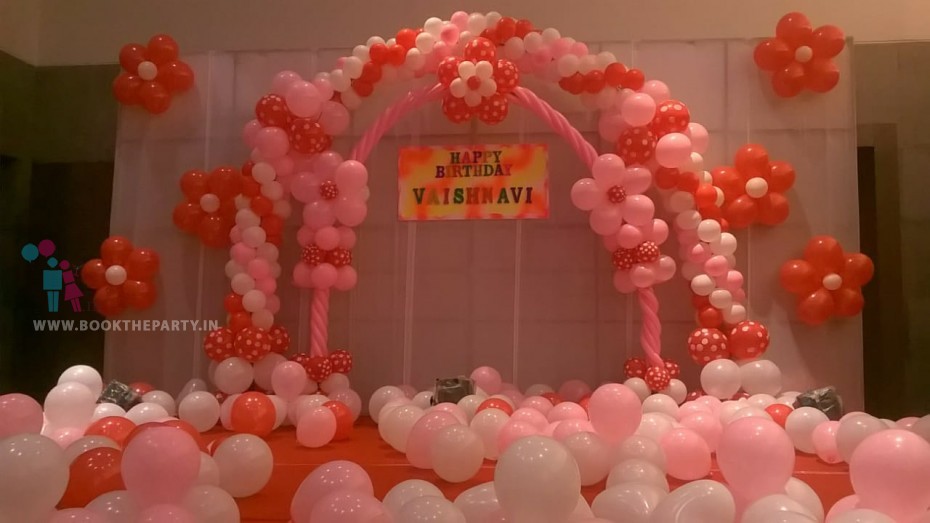 Dual Balloon Arch Theme with Flower Balloons 
