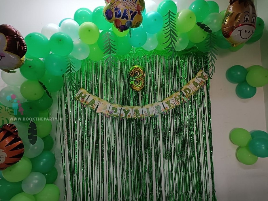 Green Balloons decor with streamers