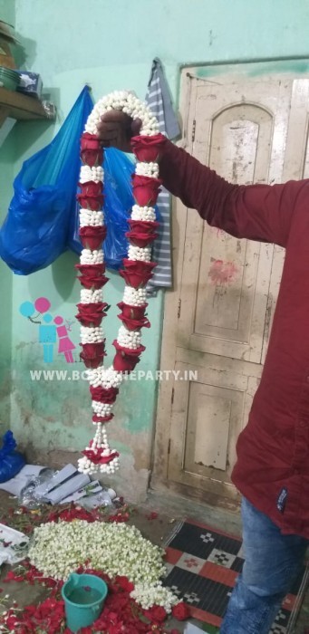 Dagar with Rose Garland