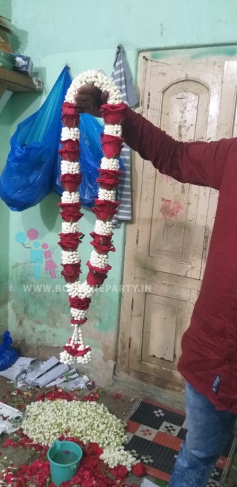 Dagar with Rose Garland